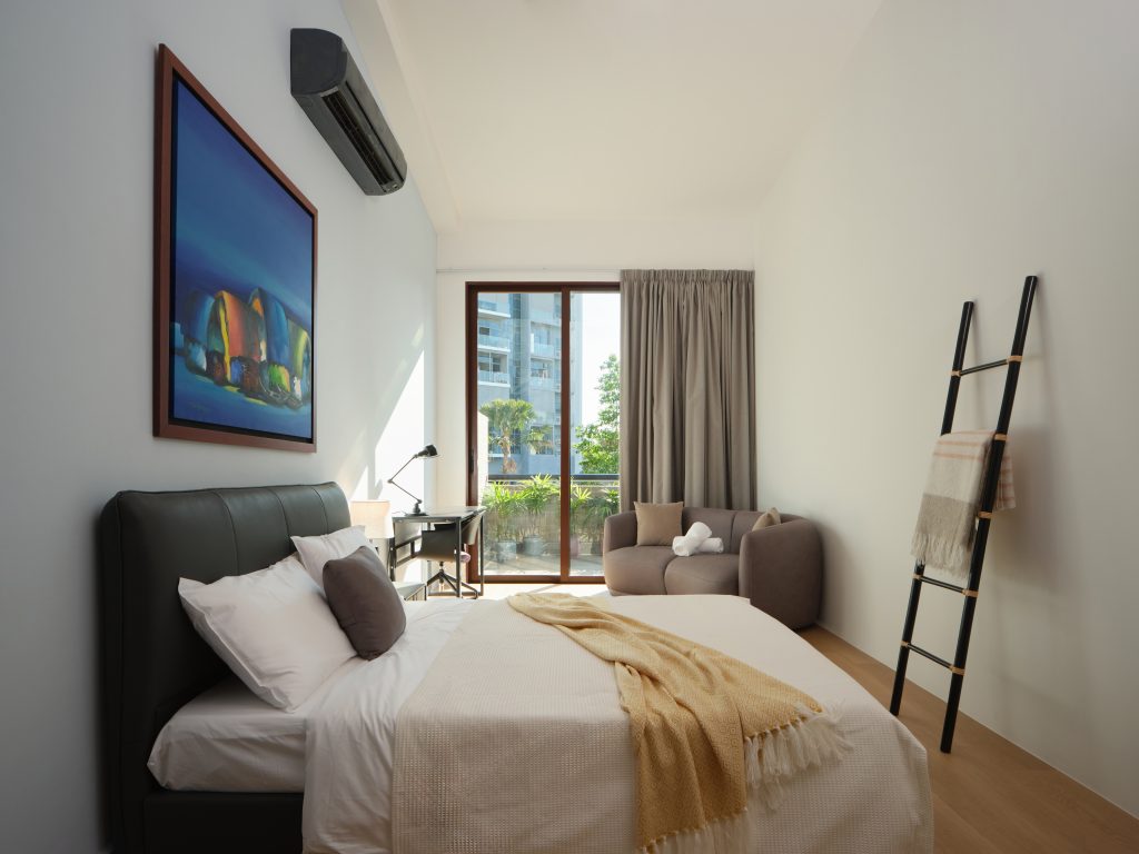 Light-filled furnished room in a Figment shophouse suited to a short legal stay