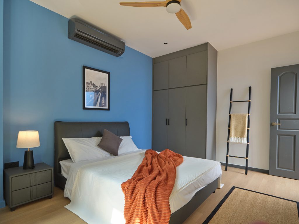 Compact, well-designed furnished studio-style room in a Singapore shophouse