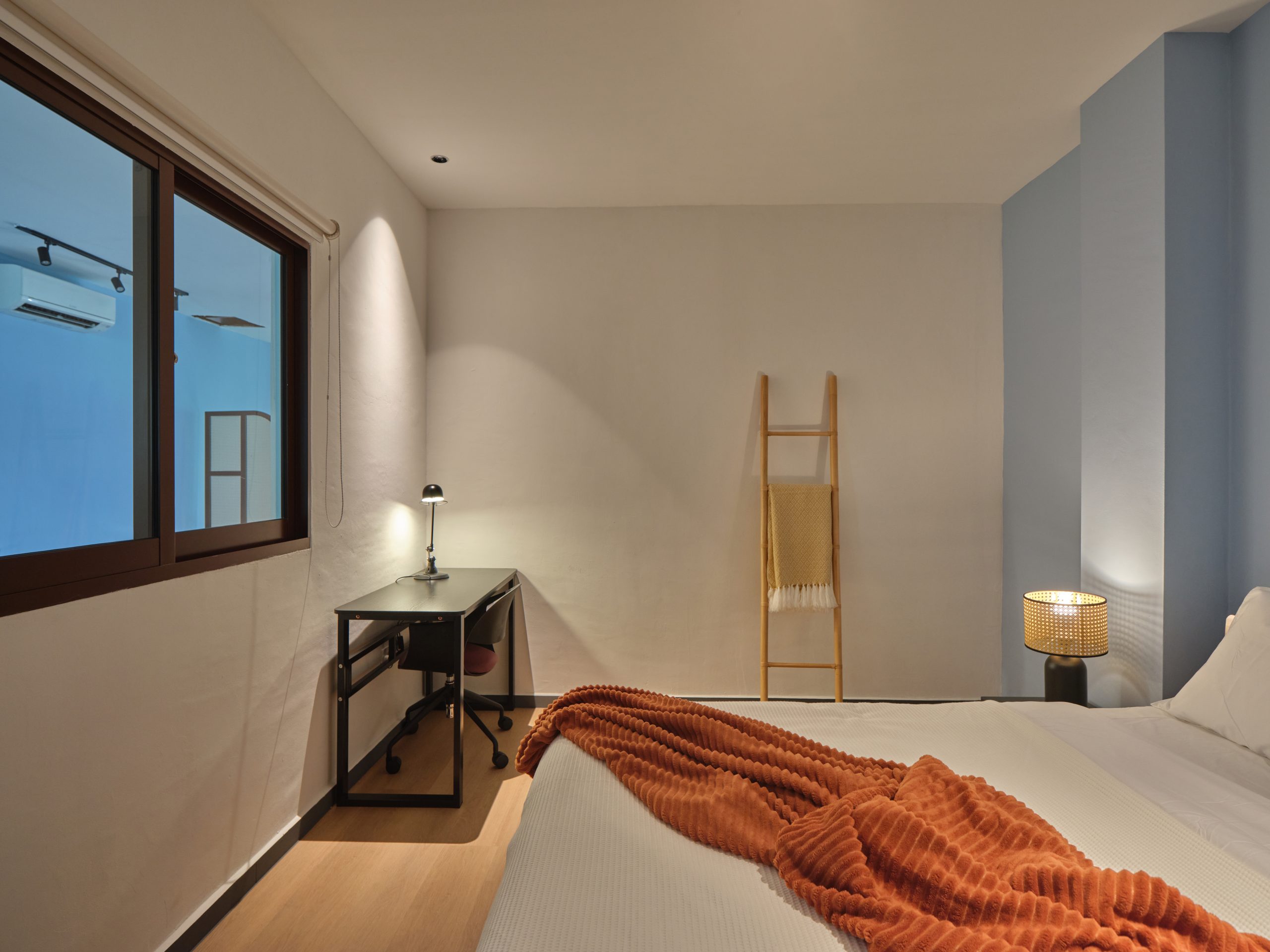 A calm corridor room at Wah Leong House designed for rest and focus