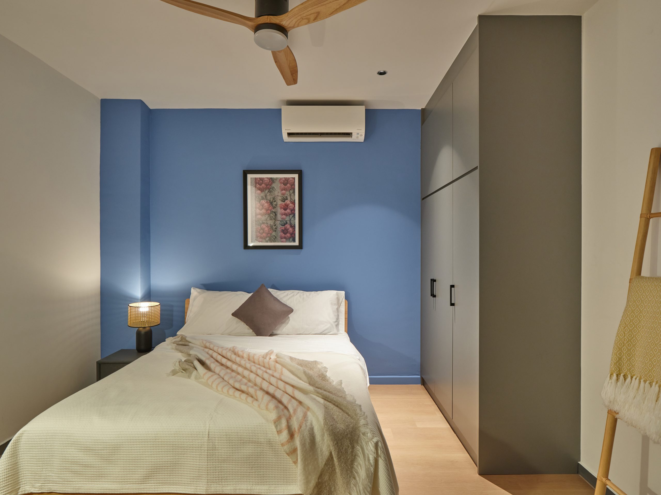 Bedroom in a Figment shophouse approved for serviced-apartment use in Singapore